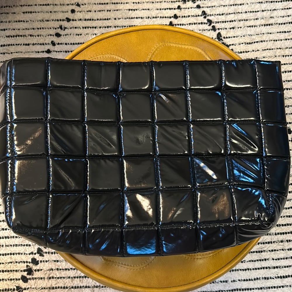 AWAKE MODE large padded clutch